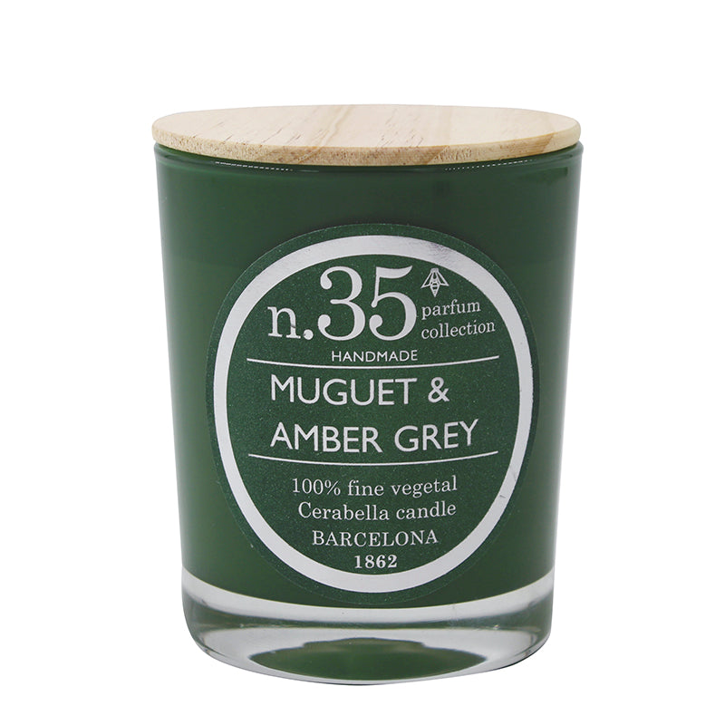 Vela aromática premium Muguet & Amber Grey de cera vegetal en vaso de cristal con tapa de madera, parte de la colección Numbers de Velas Cerabella, ideal para comprar velas aromáticas que llenan el hogar de lujo y sofisticación.